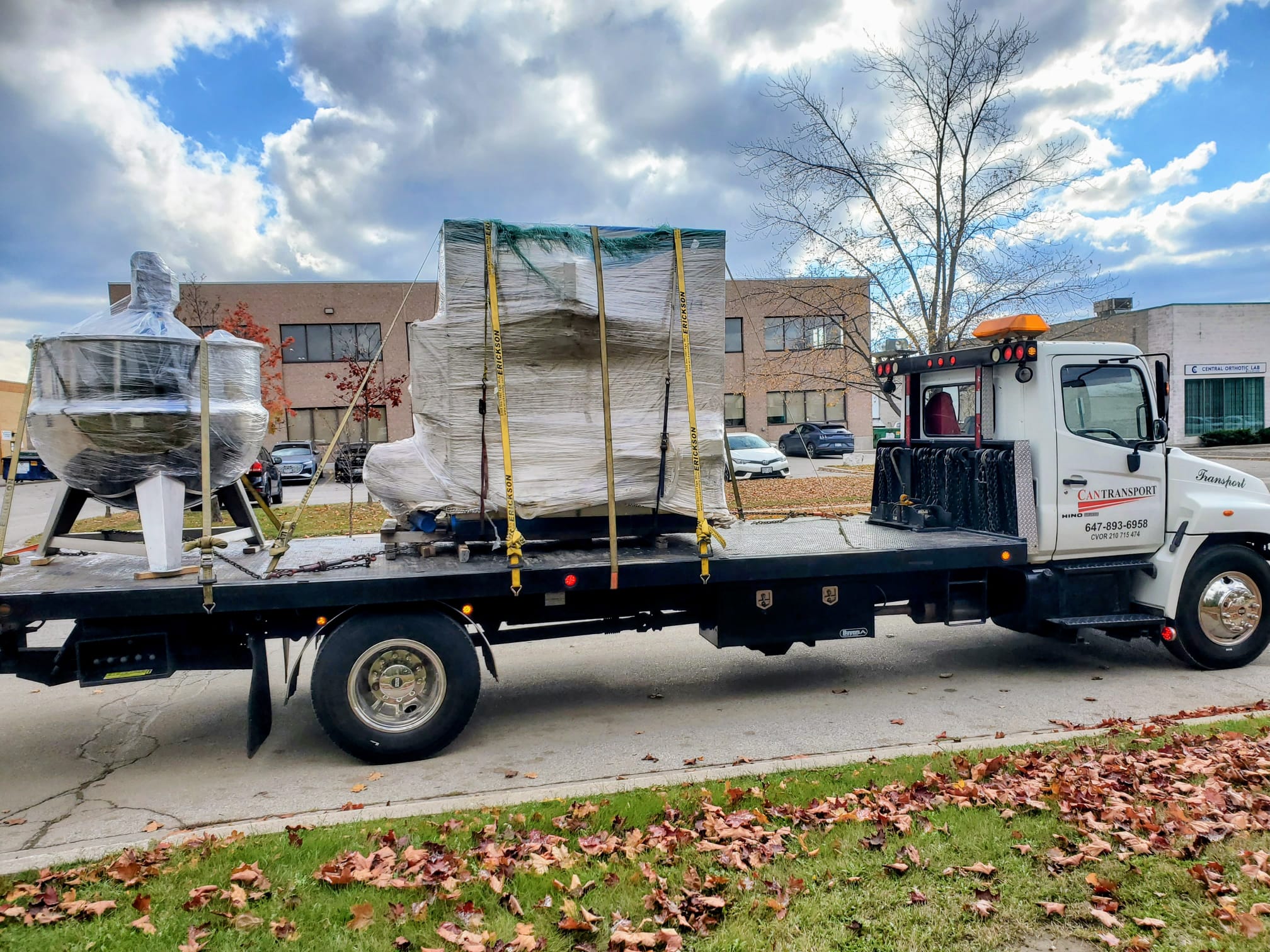 Biesse Edge CNC machine on flatbed truck